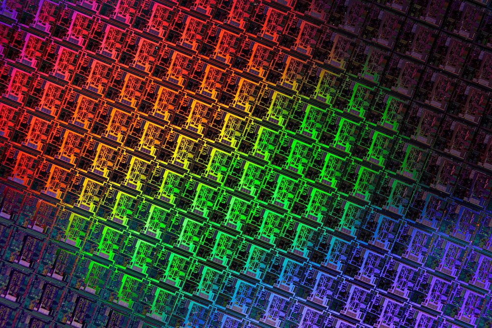 A wafer of semiconductor dies catching the light